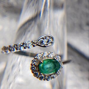 Solid silver snake ring with termaline gemstone